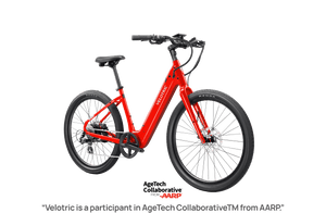 Red Velotric Breeze 1 eBike in Classic Scarlet color, side view, displayed on a white background
