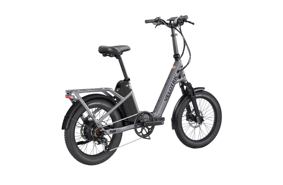 Velotric Fold 1 Plus eBike in Stone Gray, side view, folded for compact storage