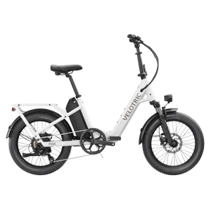 Pearl White Velotric Fold 1 eBike, side view, folded, against a plain background