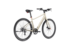 Velotric T1 ST Plus electric bike in sand color, side view, isolated on white background