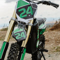 A black eMOTO eBike Drift Hero 1600w dirt bike with rugged tires, sturdy frame, and front suspension, displayed on a white background.