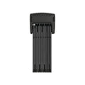 A close-up image of the Abus Bordo Granit 6500K eBike lock, displayed in-store, showing its sturdy black folding design and secure locking mechanism.
