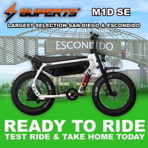 Super73 M1D SE eMOTO eBike in Baja color, side view, ready to ride, displayed on a plain background