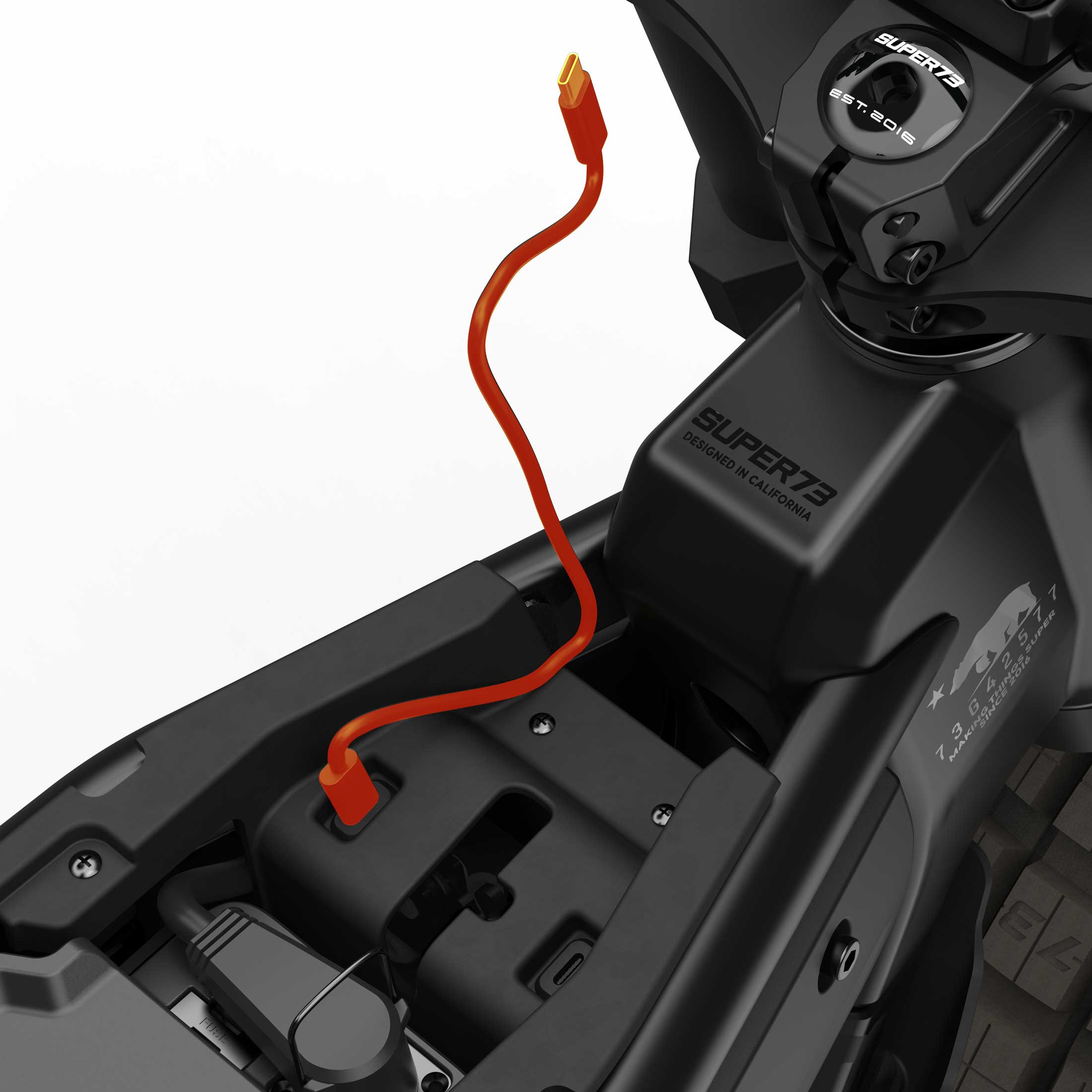 Super73 MZFT SE eMOTO eBike in Blackout color, shown in its original box with packaging materials, product components visible.