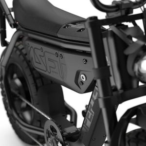 Super73 MZFT SE eMOTO eBike in Blackout color, shown in its original packaging inside the box