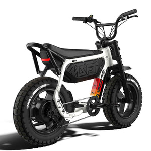 Side view of the eMOTO eBike Super73 MZFT SE in a showroom, highlighting its black frame, thick tires, and minimalist design.