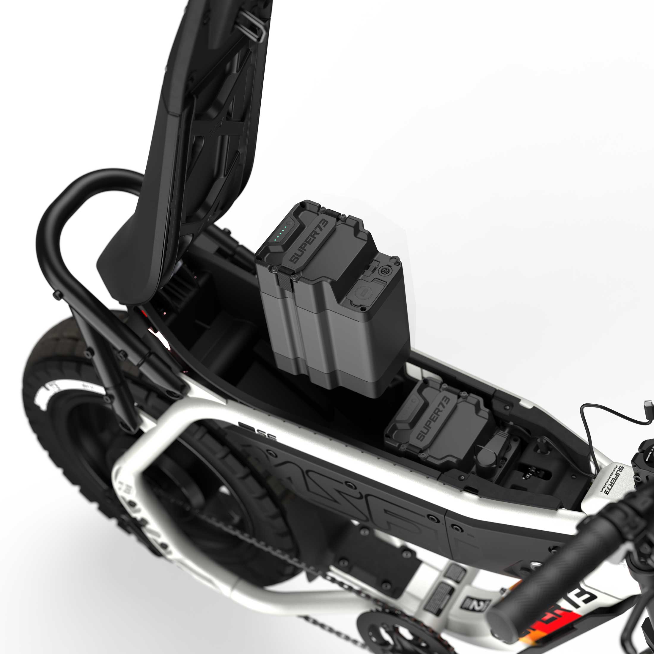 Side view of the eMOTO eBike Super73 MZFT SE in a showroom, showcasing its sleek frame and modern design, available for in-store pickup only.