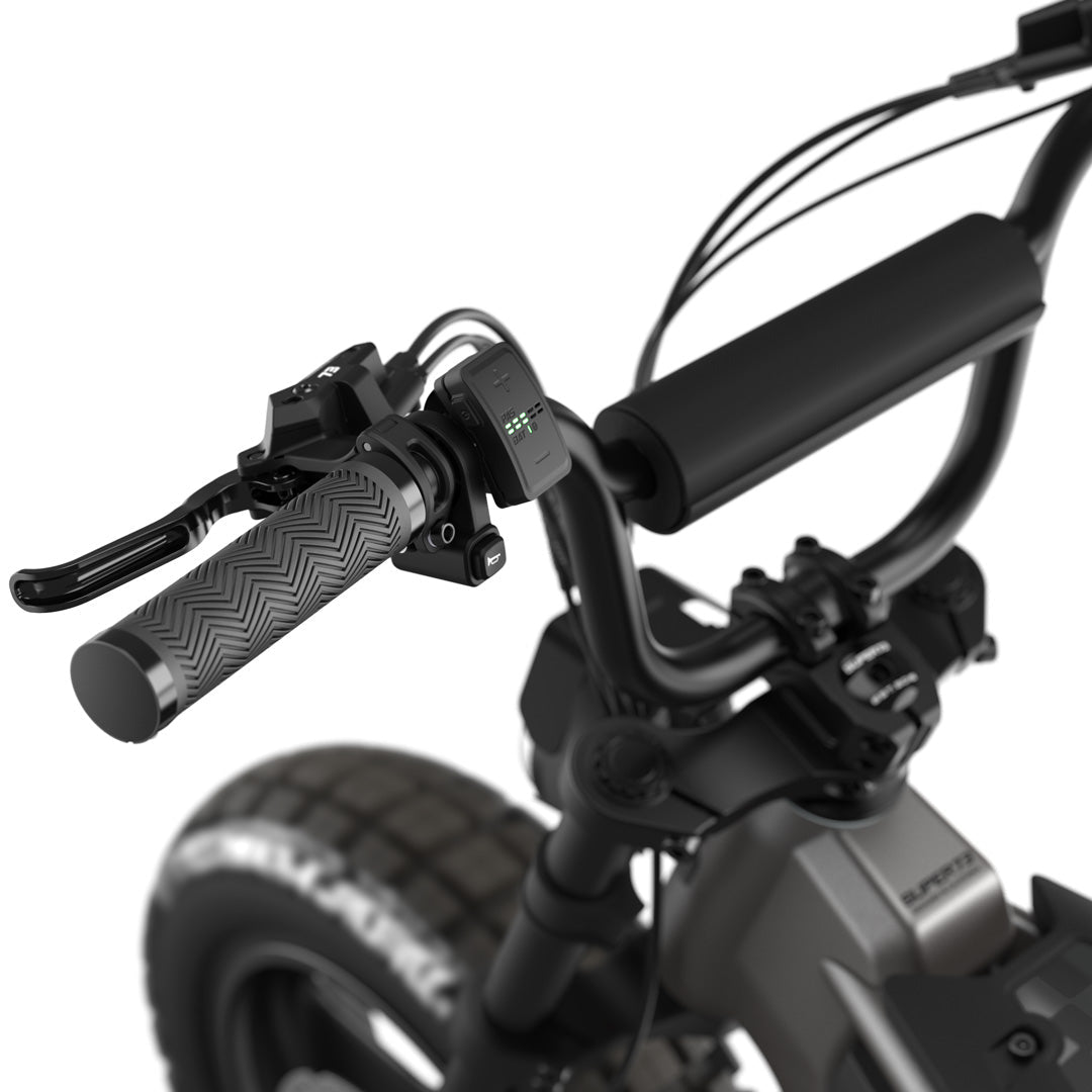 Super73 MZFT eMOTO eBike in Titanium Ore color, shown inside its original packaging box, product image number 4