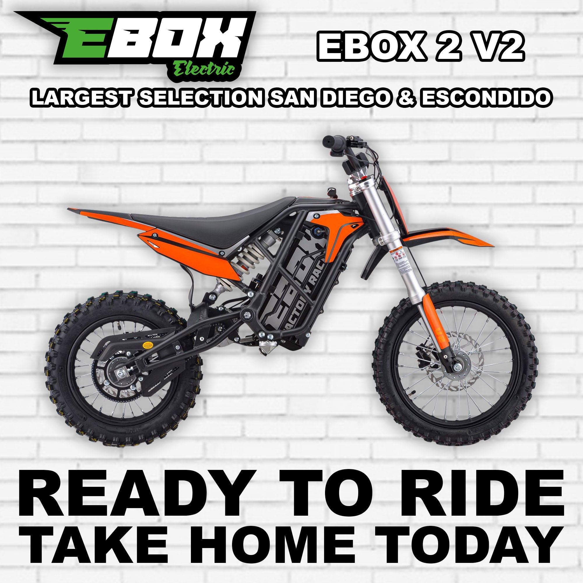 eMOTO Ebox 2 V2 electric bike in orange, side view, displayed against a white background