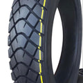eMOTO Tire 12" CST 80/100-12, black off-road motorcycle tire, side view against white background