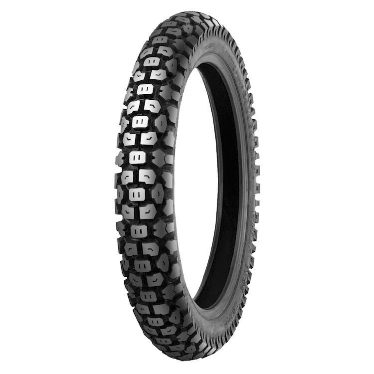 Side view of a Shinko 244 eMOTO tire, size 2.75-19, showing tread pattern and black rubber construction.