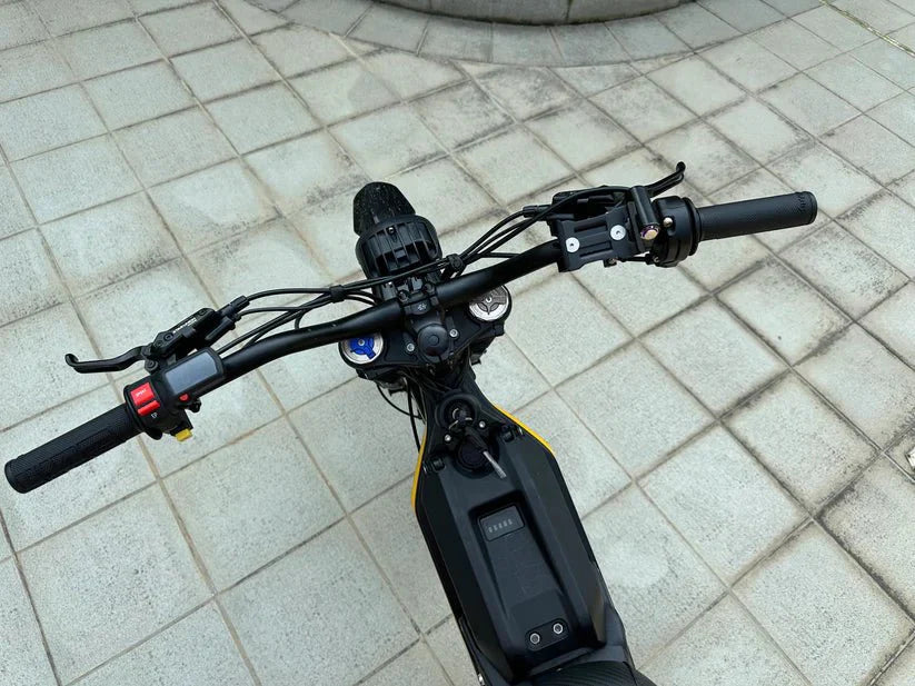 A black eMOTO FREEGO Natkie N1 Electric Dirt Bike with a 4000W motor, designed for off-road use, shown from a side angle on a plain background.