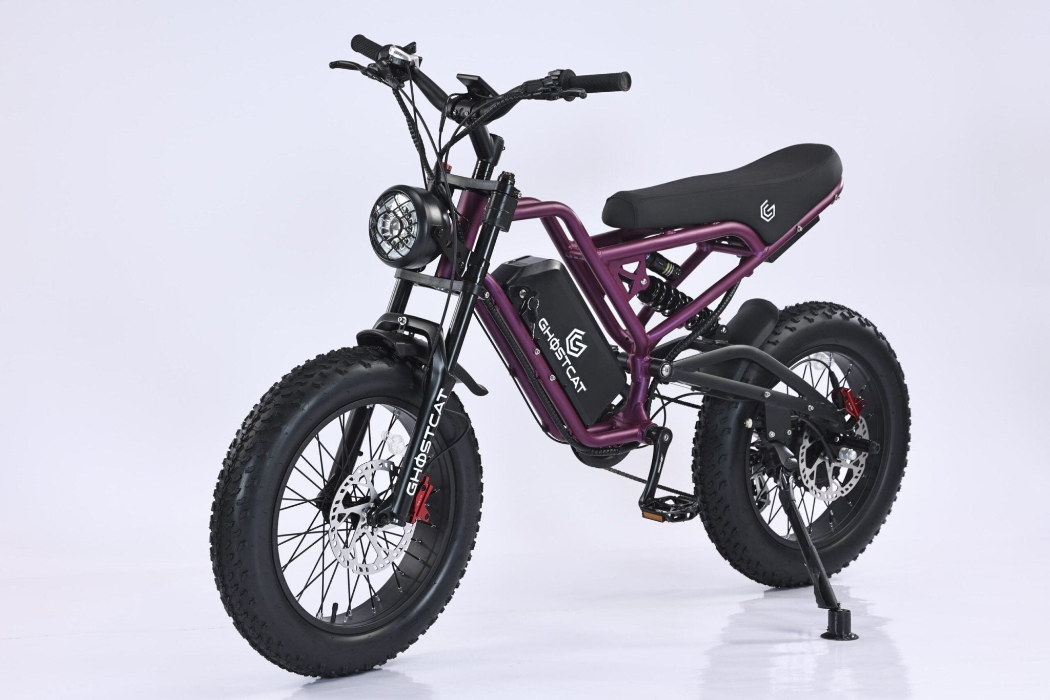 Dark purple eMOTO GHOSTCAT F3.2 electric scooter, 1500W model, side view against a dark background