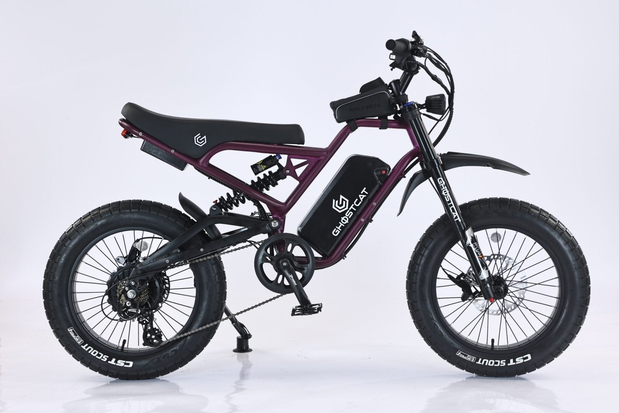 Dark purple eMOTO GHOSTCAT F3x.2 1500W Pro electric bike, side view, on a neutral background