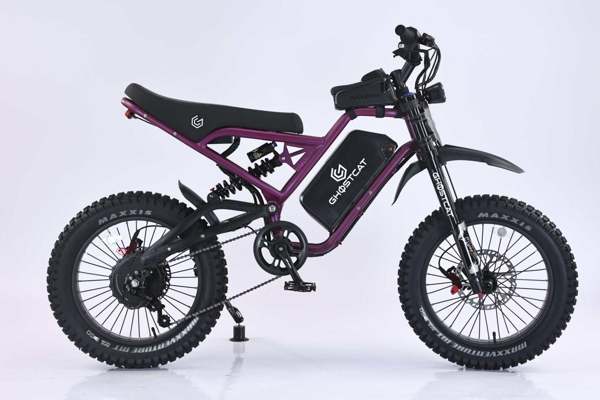 Dark purple eMOTO GHOSTCAT F4X Pro electric bike, side view, on a plain background