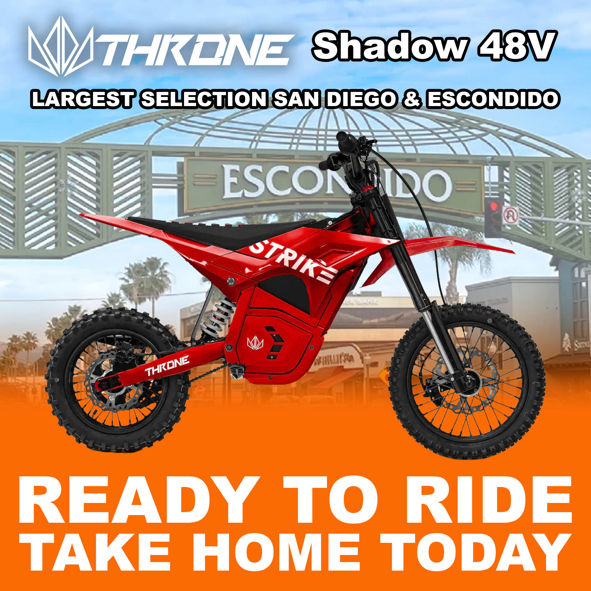 Red eMOTO Strike Shadow 48V electric motorcycle, side view, on a white background