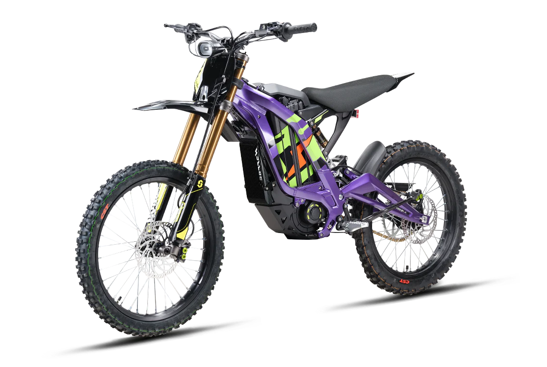 Purple eMOTO Surron Light Bee X electric dirt bike, side view, on a white background