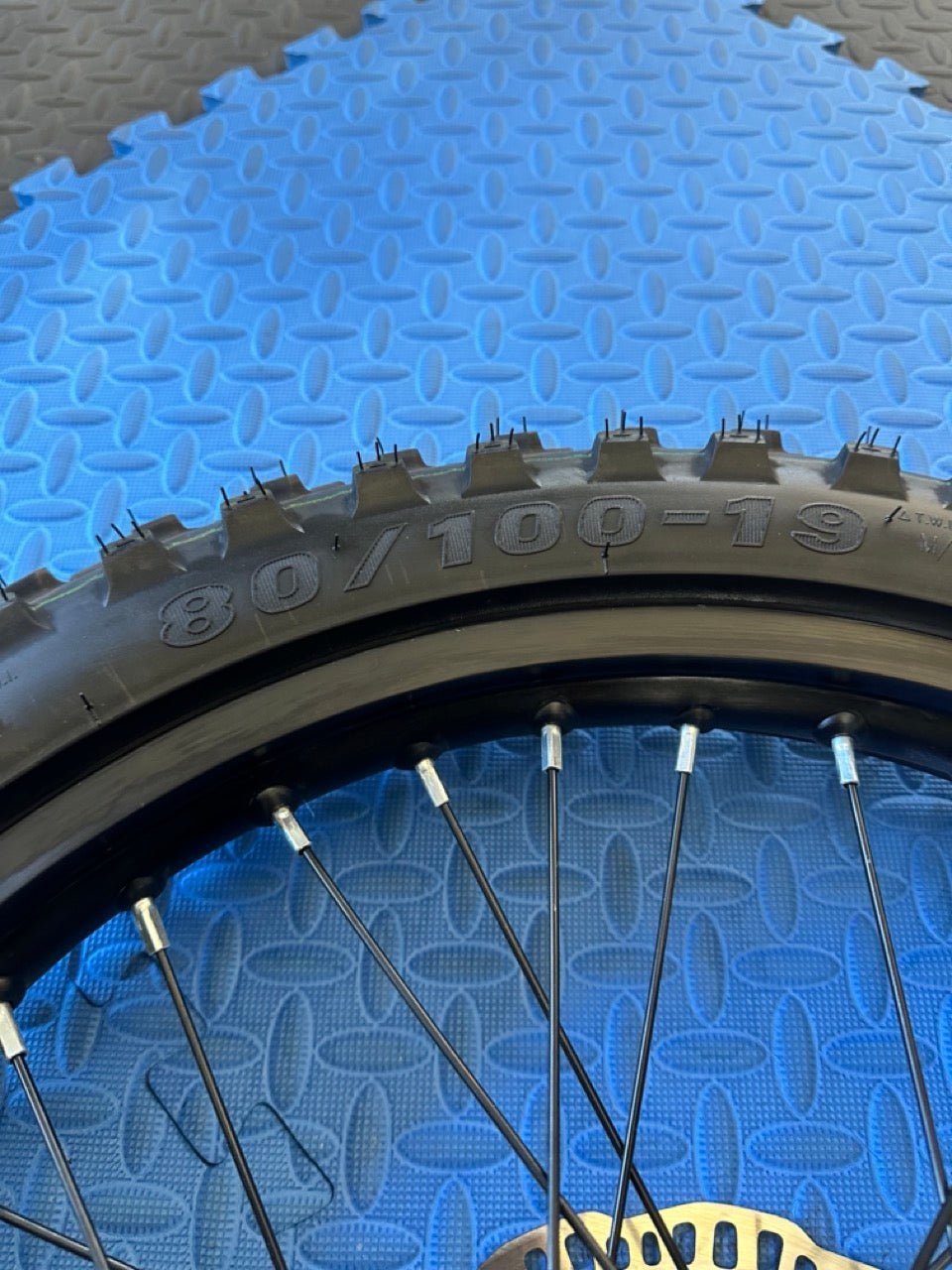 Talaria eMoto 19-inch rear wheel and CST knobby tire set for electric dirt bikes, shown without rotor or sprocket, product image 469508