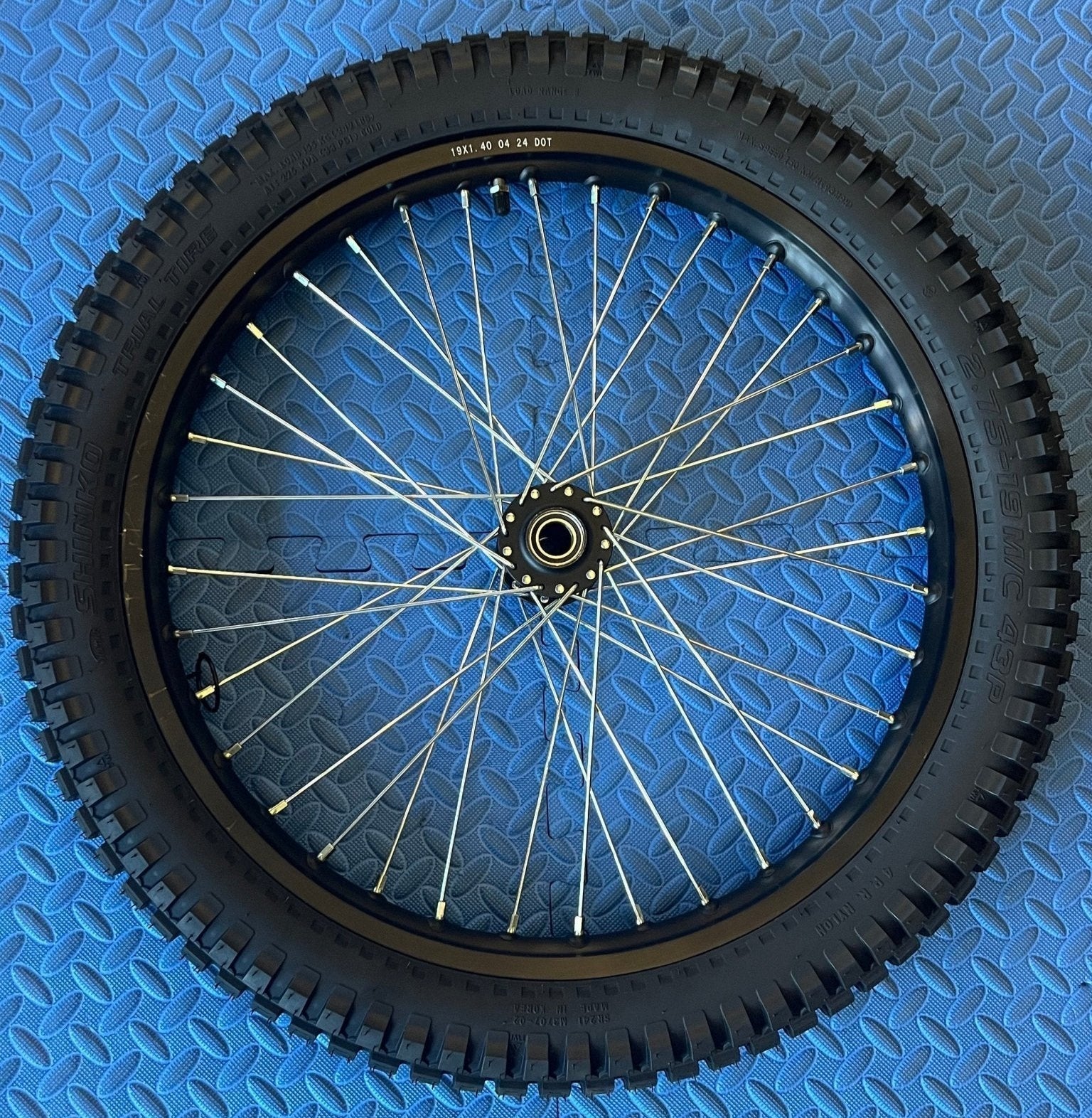 eMOTO Throne eMoto 19-inch front wheel and Shinko 241 dual sport tire set for e-moto bikes, shown without rotor or sprocket, product image 855457