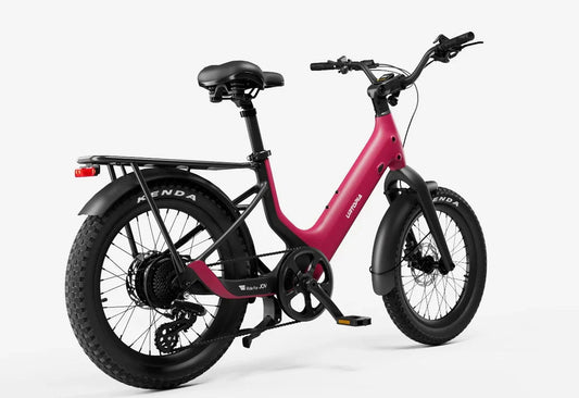 Side view of the Urtopia Carbon Joy eBike in a modern setting, showcasing its lightweight carbon frame, sleek design, and integrated display on the handlebars.