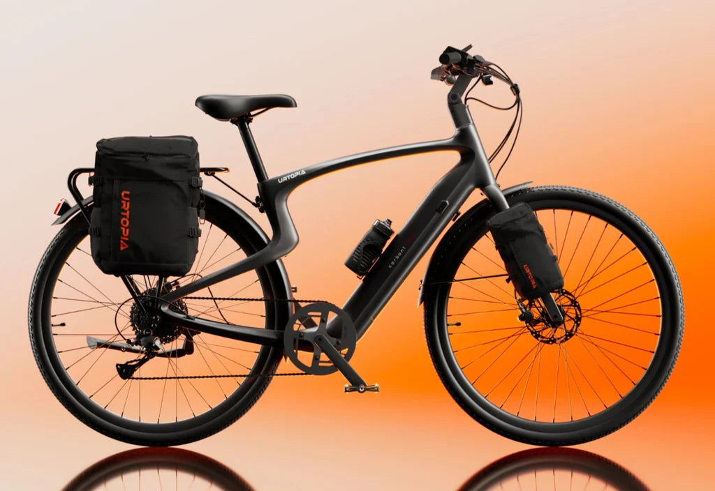 Side view of the Urtopia Carbon Classic eBike showcasing its lightweight carbon fiber frame, sleek black design, and integrated battery on a white background.
