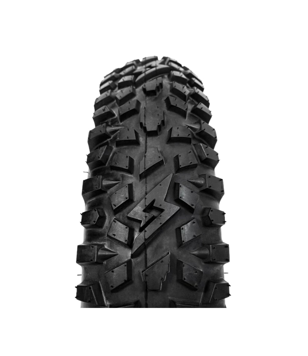 Close-up view of a GRZLY Super73 tire featuring a rugged tread pattern designed for off-road and urban riding.