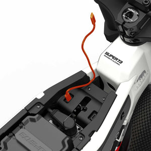 Side view of the eMOTO eBike Super73 M1D SE in a showroom, showcasing its sleek frame, thick tires, and modern design; labeled as in-store pickup only.