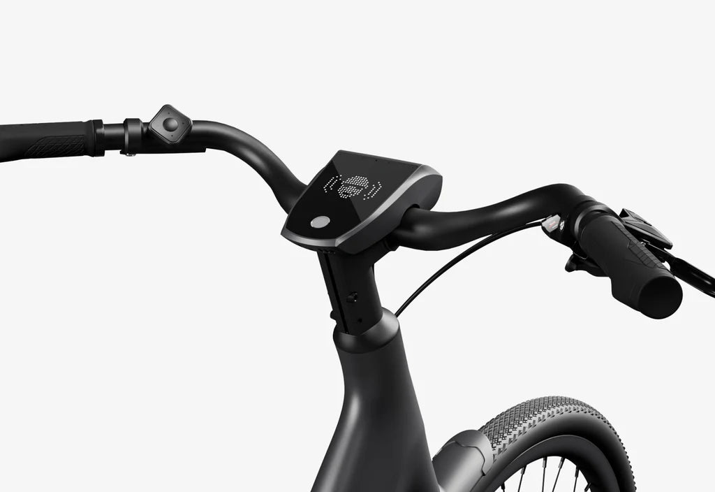 Side view of the Urtopia Carbon 1 Step Thru eBike in matte black, showcasing its lightweight carbon frame, step-through design, and sleek modern styling against a plain background.