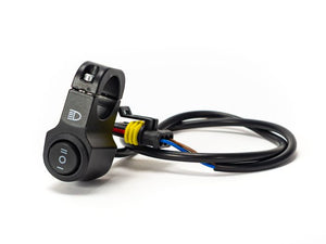 Close-up view of the Stomp Ebox EBX RS headlight, showing its modern design and LED light elements.