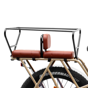 A Murf eBike equipped with a black cargo backrest accessory, shown mounted on the rear rack for added passenger comfort.