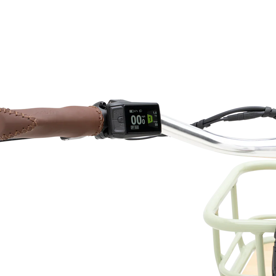 Side view of the eBike Murf Gigi 2.0 in a studio setting, showcasing its sleek frame, wide tires, and modern design.