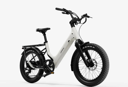 Side view of the Urtopia Carbon Joy Ultra eBike in a modern setting, showcasing its sleek carbon frame, integrated battery, and minimalist design.