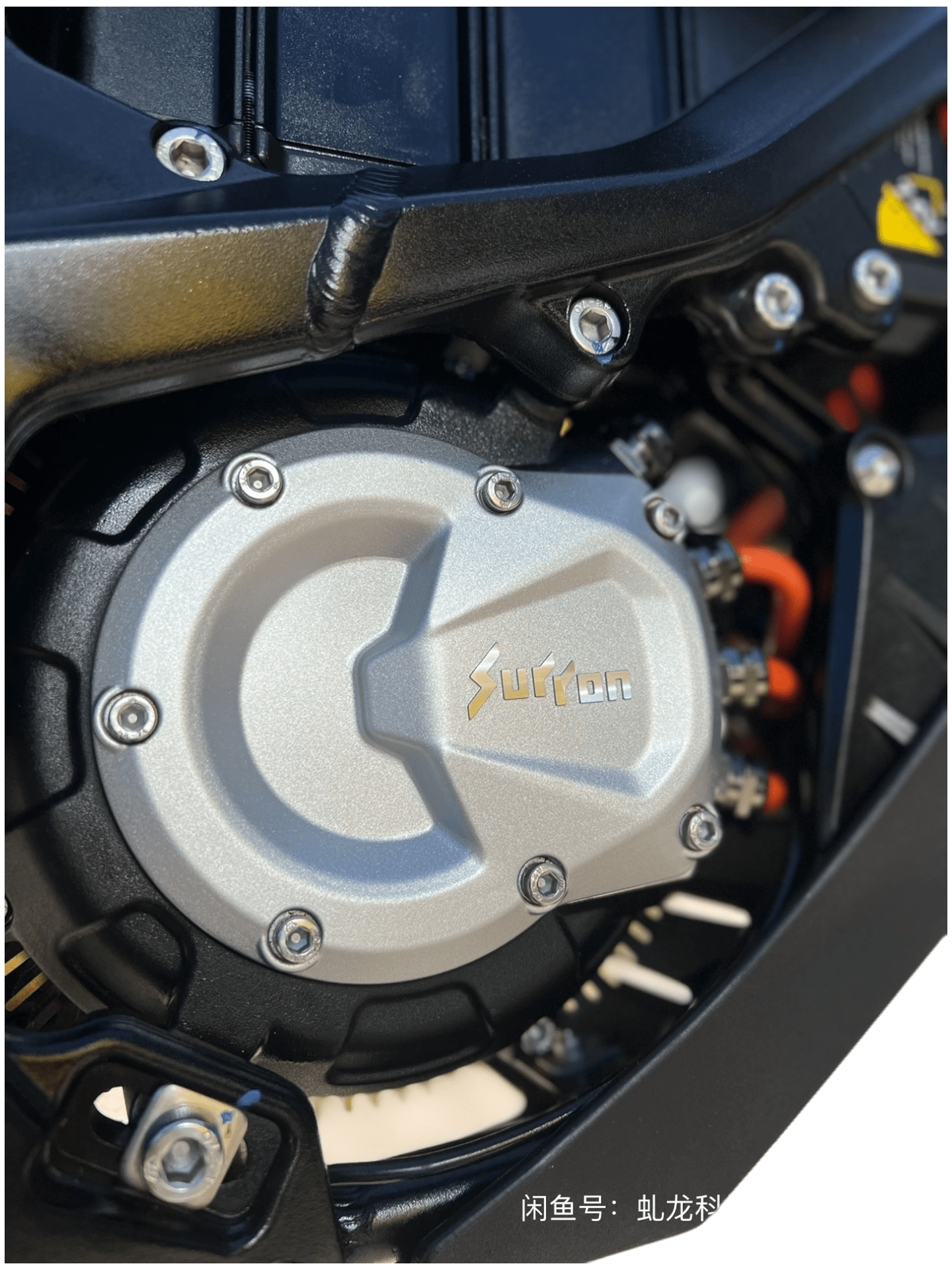 Side view of a 2025 Surron Ultra Bee 21kW electric dirt bike in black and yellow, displayed on a white background.