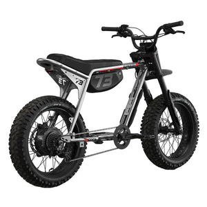 Side view of the Super73 Z Adventure Series Core eMOTO eBike in a showroom, highlighting its rugged frame, thick tires, and minimalist design.