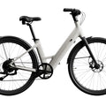 Urtopia Carbon 1 Step Thru eBike in creme color, side view, showcasing lightweight carbon frame and step-through design