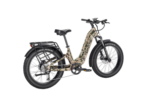 Velotric Nomad 2X Step-Thru eBike in multi-terrain camo color, shown from the side on a white background