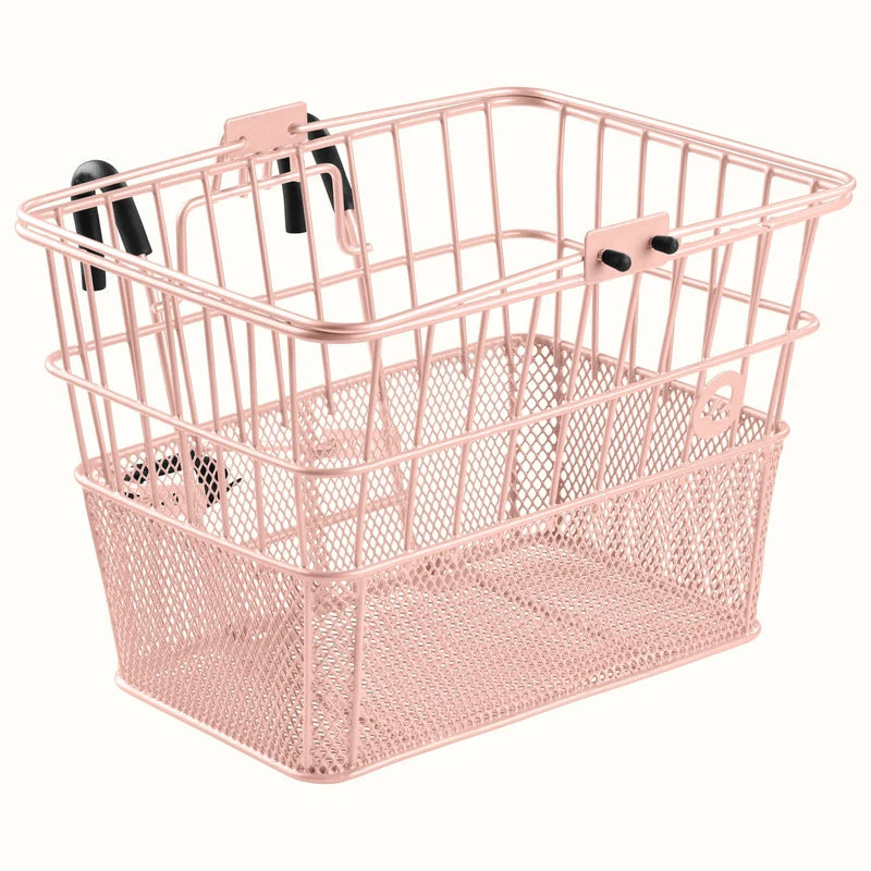 Blush pink Retrospec Apollo steel bike basket attached to an eBike, product image on white background