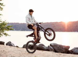 Offroad electric e-moto style eBike, eMOTO FREEGO X2, 3000W motor, rugged tires, black frame, displayed on a white background.