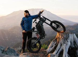 Side view of the eMOTO FREEGO X2 Pro Offroad Electric e-Moto Style eBike-Moto 3000W, showcasing its rugged tires, sturdy frame, and modern off-road design.