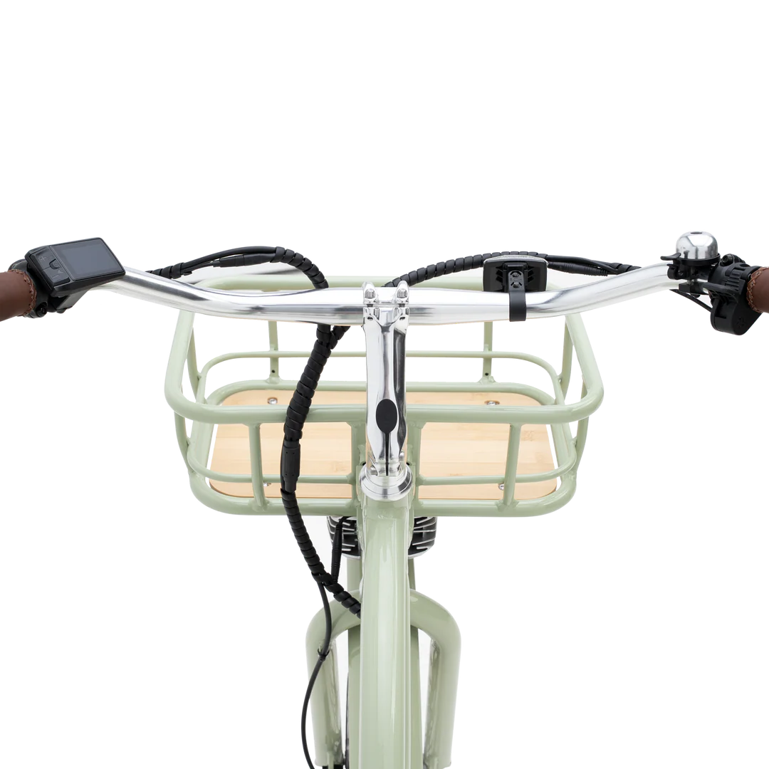 Side view of the Murf Gigi 2.0 eBike in sand color, showcasing its step-through frame, wide tires, and rear cargo rack against a plain background.