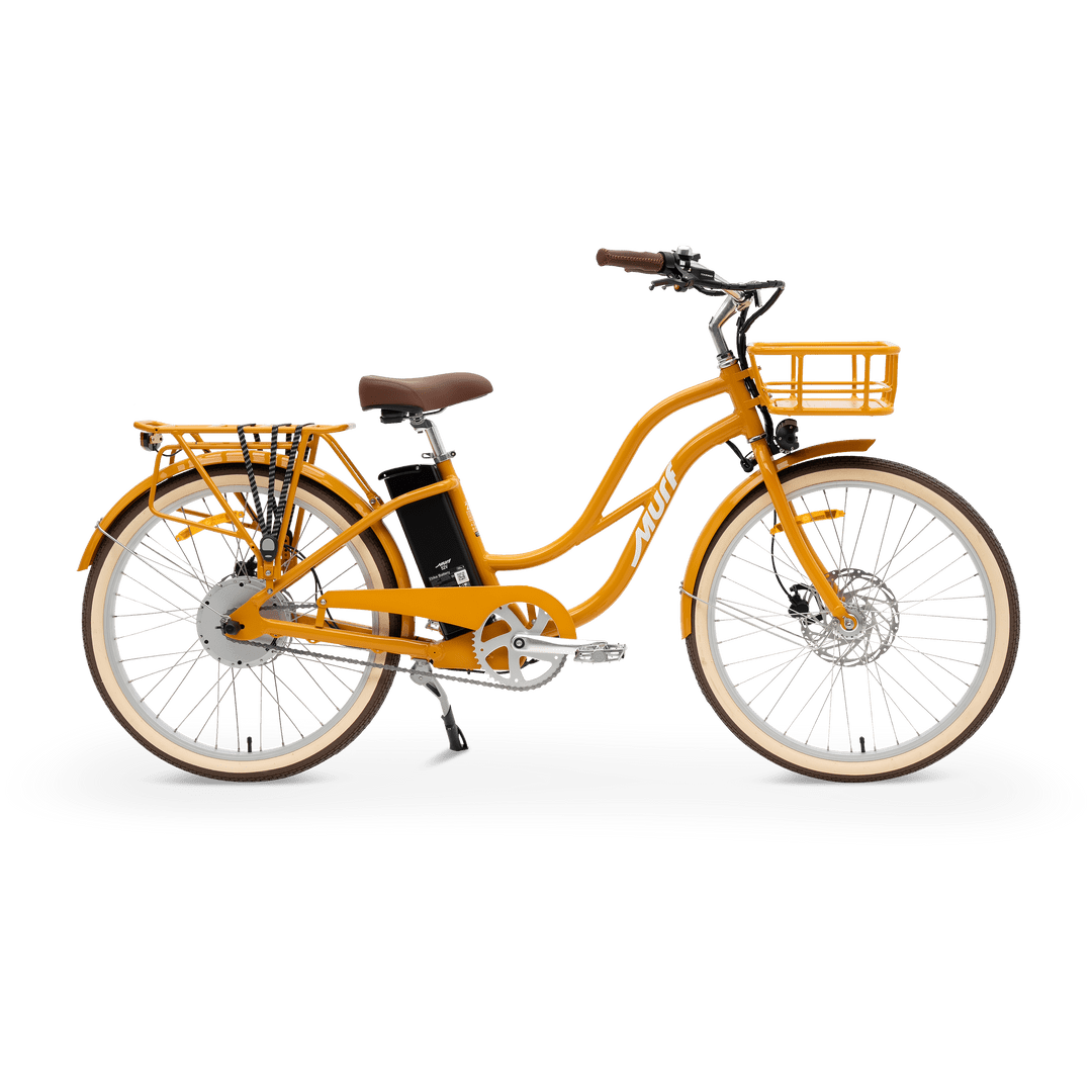 A white MURF Gigi Cruiser eBike with wide tires, step-through frame, and brown leather saddle, displayed on a plain background.