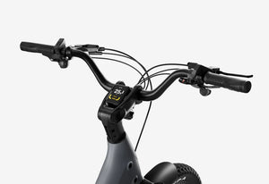 Side view of the Urtopia Carbon Joy eBike in charcoal gray, showcasing its sleek frame, integrated battery, and modern design against a plain background.