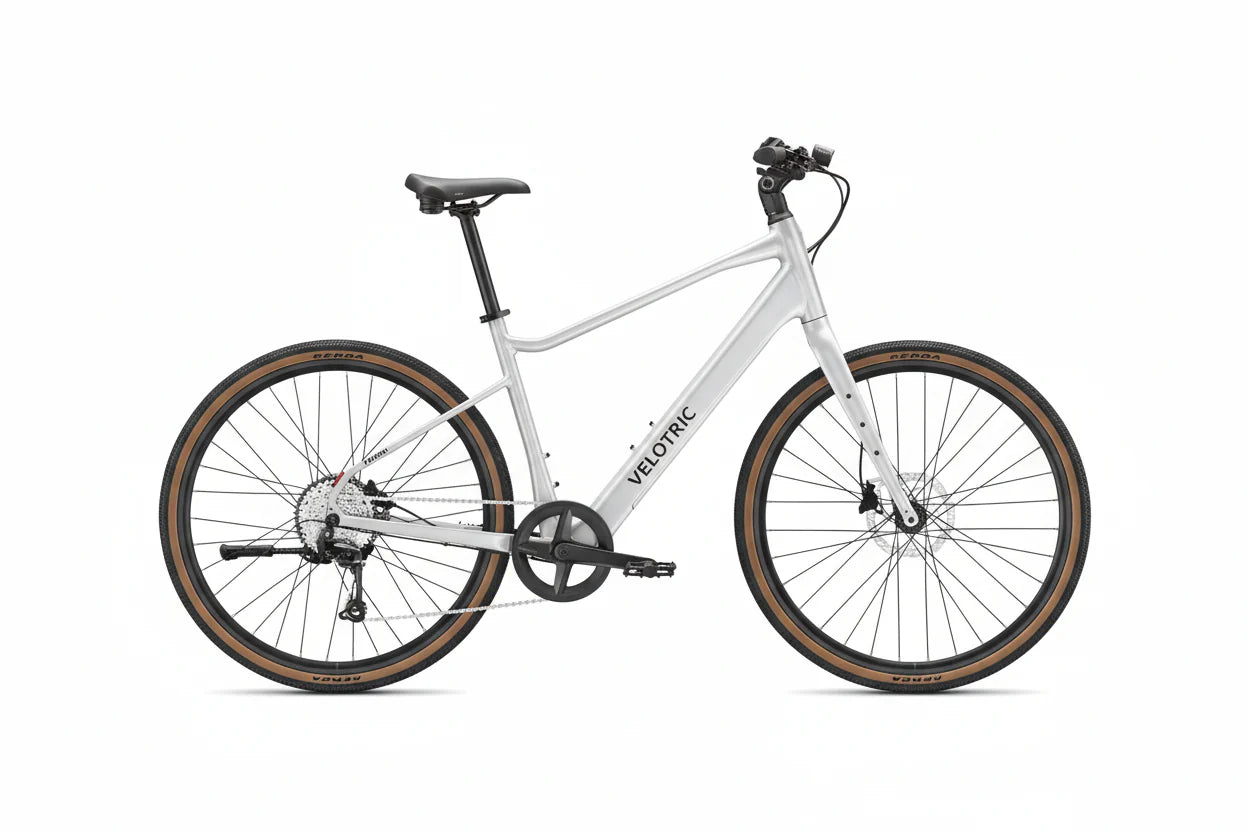 Side view of the Velotric Tempo eBike in a studio setting, showcasing its step-through frame, rear rack, and upright handlebars.