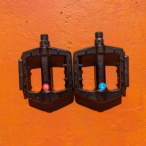 A metal bicycle pedal in Style 2 design, featuring a sleek, durable construction with textured grip surface and visible mounting holes.