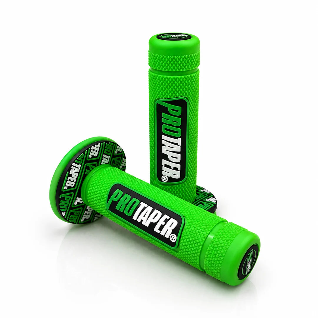 Green ProTaper handlebar grips with textured surface for enhanced grip and control.