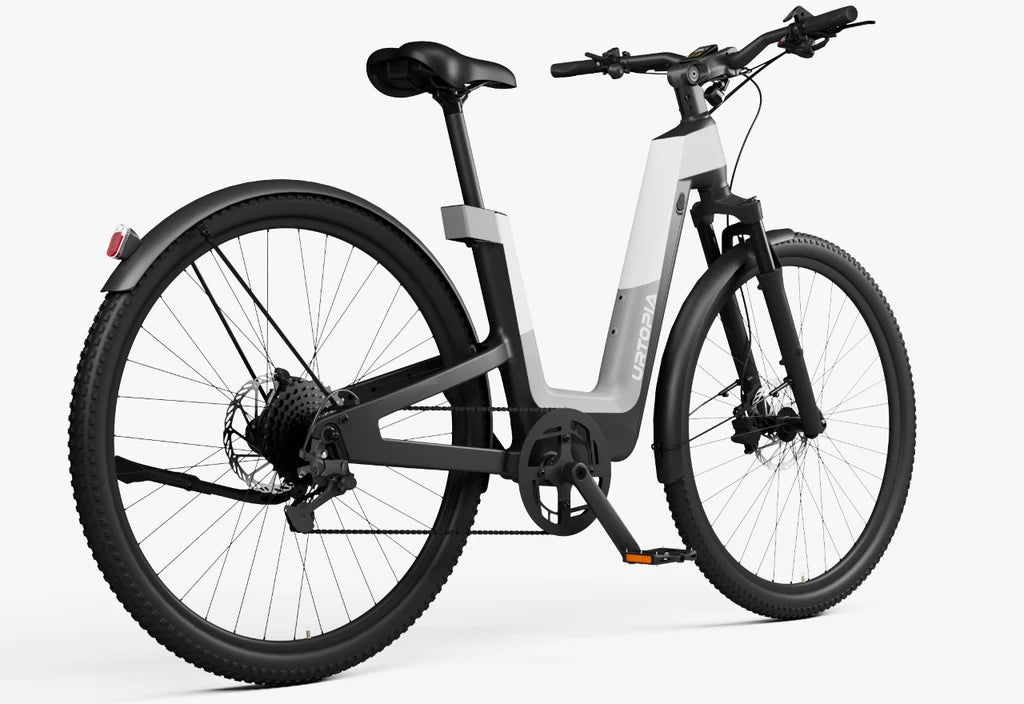 Side view of the Urtopia Carbon Fusion Pro eBike in Elegant Gray, showcasing its sleek frame, integrated battery, and modern design against a plain background.