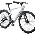 Side view of the Urtopia Carbon 1 Pro eBike in creme color, showcasing its lightweight carbon frame, sleek design, and integrated display on the handlebars.