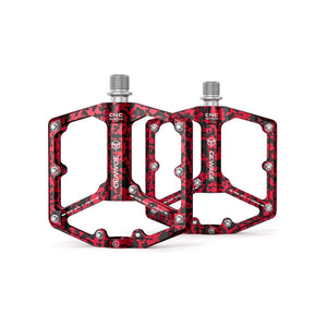 Red alloy bicycle pedals with a red camouflage pattern, shown in product image labeled "Red 9"