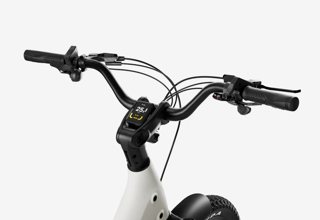Side view of the Urtopia Carbon Joy eBike in creme color, showcasing its lightweight carbon frame, sleek design, and integrated battery against a plain background.