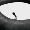 A 20x4.5/5.0-406 eBike inner tube from Tire Co. displayed coiled with a visible valve stem, set against a plain background.